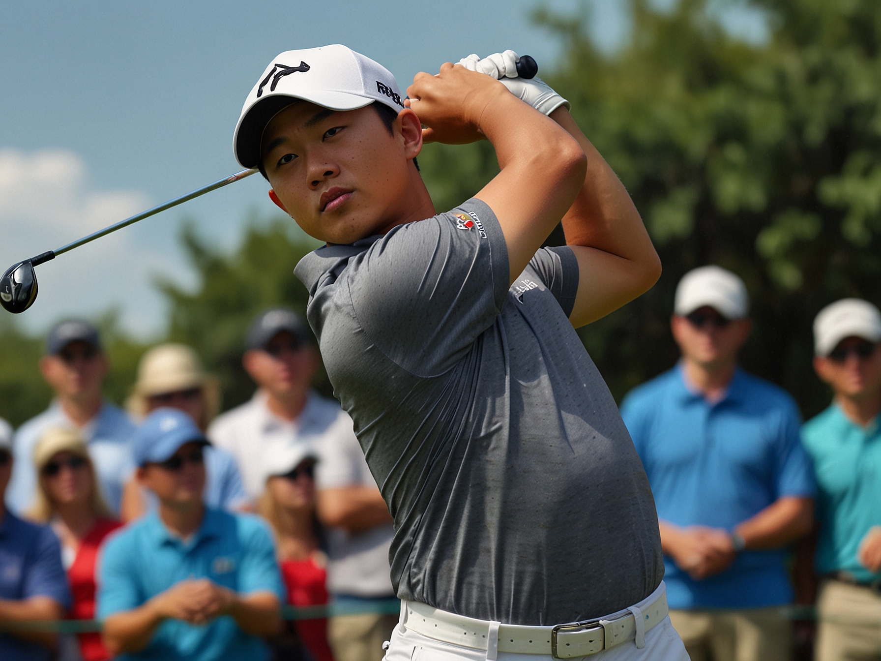Tom Kim tees off at the Travelers Championship, showcasing his precise swing and form. The young golfer leads by two strokes, impressing fans and competitors alike.
