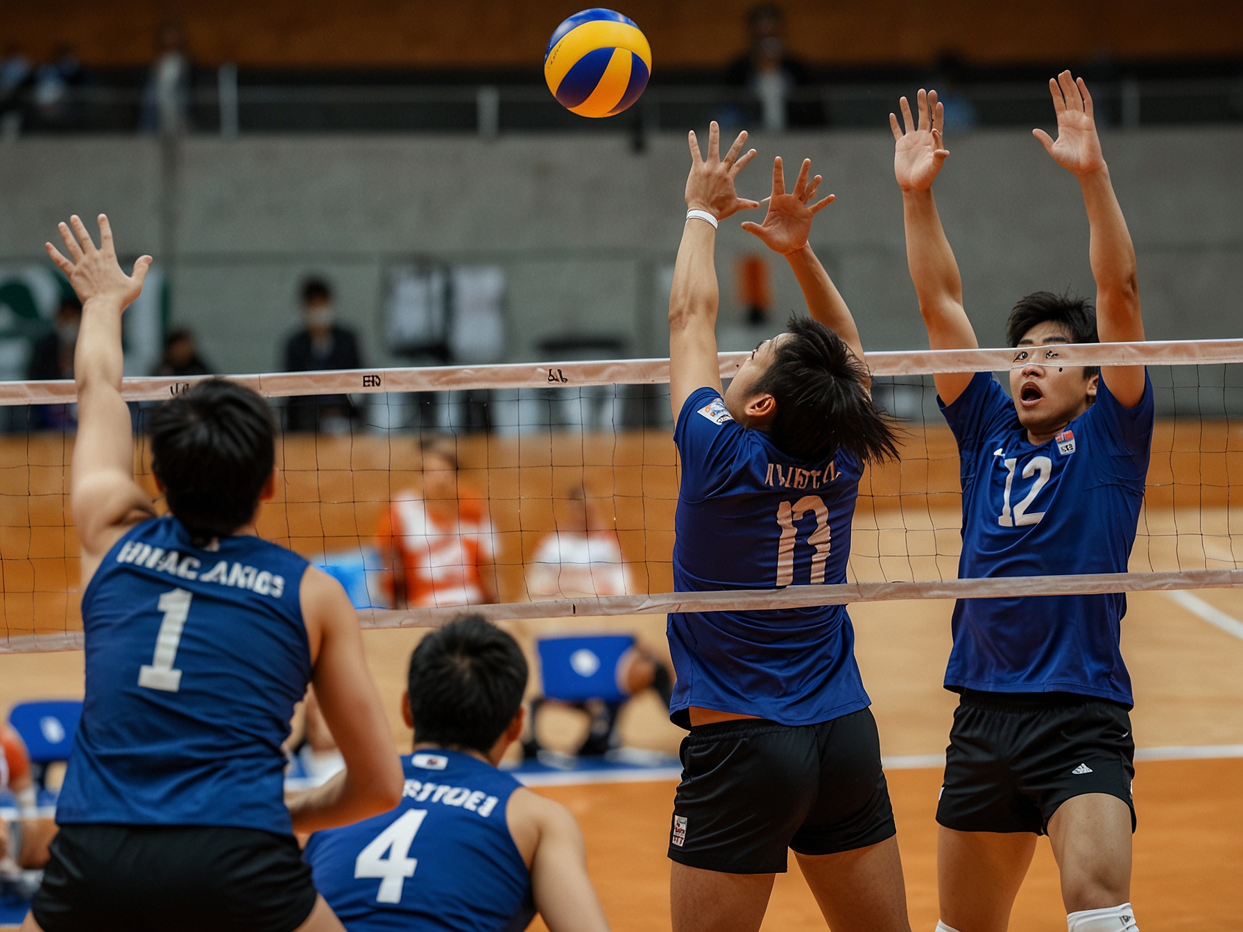 Yuji Nishida powers a spike past the Netherlands' blockers at the net during Japan's sweeping victory in the VNL. His performance was key to setting the tone early in the match.