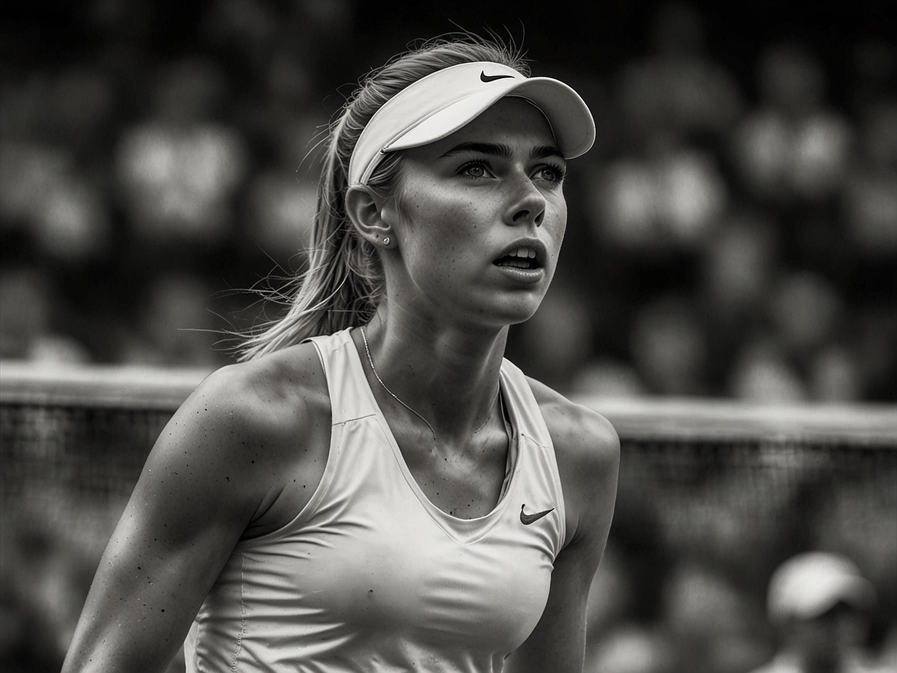 Katie Boulter displaying strong composure and focus on court, shortly after the Grand Slam champion's mishap, highlighting her determination and rising prowess in the tennis world.