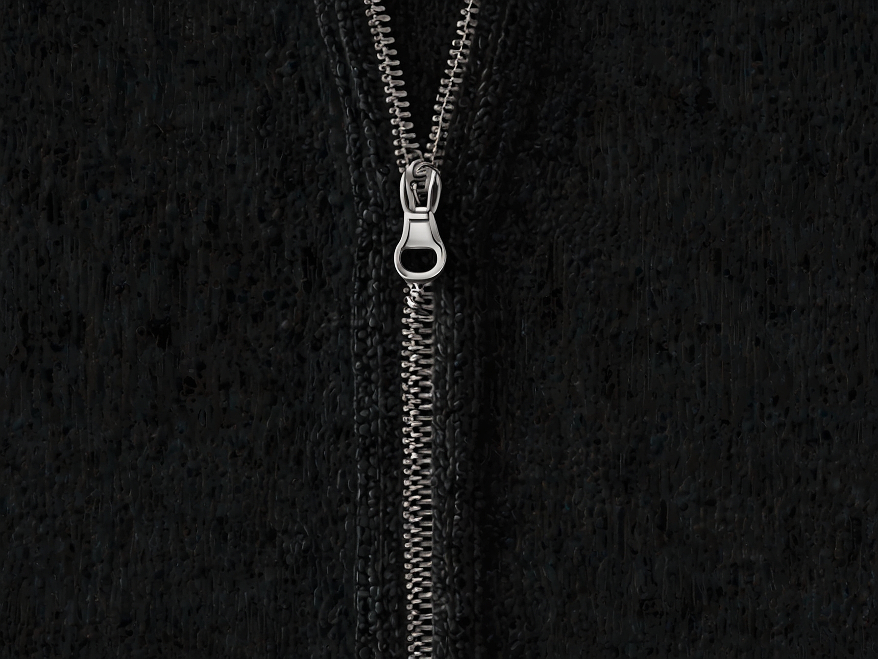 A close-up image of the new Merino Zip Knit, highlighting its stylish design and luxurious fabric, illustrating the blend of fashion-forward elements with cycling heritage.